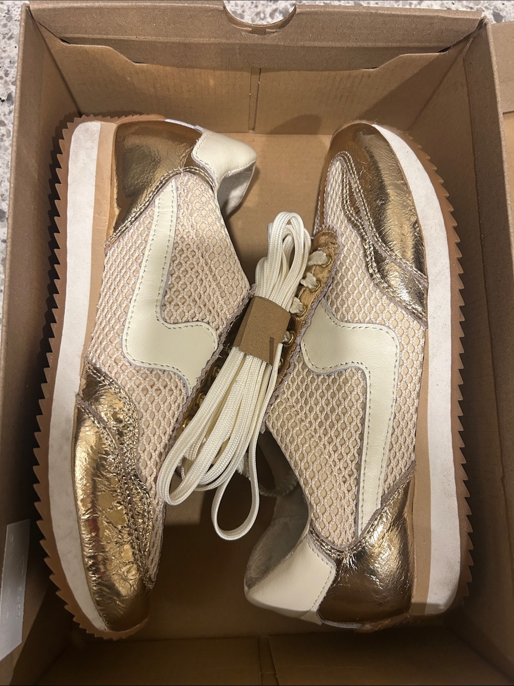 Dolce Vita Cream and Metallic Gold Women's Lace-Up Sneakers
